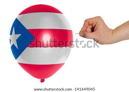 exploding balloon colored in national flag of puertorico