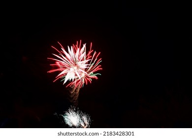 Exploding Pink, Green And White Fireworks