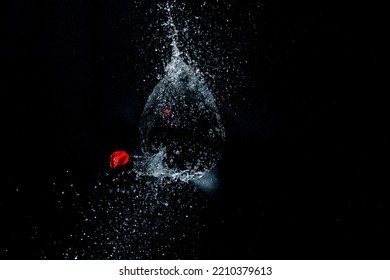 Exploding Water Balloon. High Speed Photography.