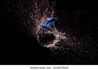 Exploding Water Balloon. High Speed Photography.