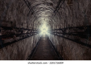 Exploration of a bunker from the second world war with a flashlight