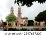 Explore the captivating charm of San Luis de la Paz Church in Guanajuato. This historic site showcases intricate architecture and tranquil gardens, offering a glimpse into the area