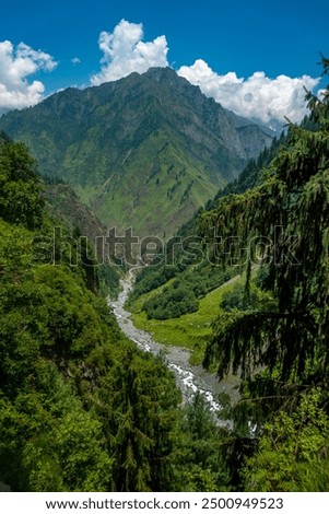 Explore Chamba Valley's stunning glacial rivers and towering Himalayan peaks, including the sacred Mani Mahesh Kailash pilgrimage of Lord Shiva. Himachal Pradesh India.
