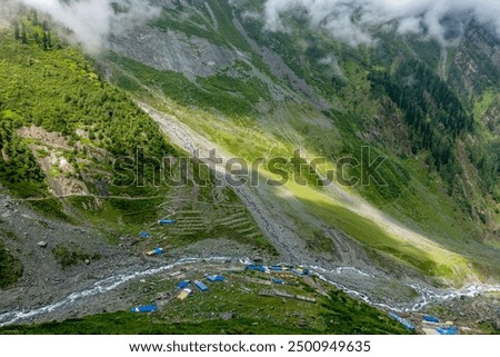 Explore Chamba Valley's stunning glacial rivers and towering Himalayan peaks, including the sacred Mani Mahesh Kailash pilgrimage of Lord Shiva. Himachal Pradesh India.