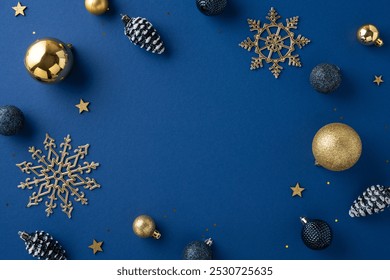 Explore elegant Christmas decorations on a deep blue background, featuring golden snowflakes, ornaments, and stars. Perfect for crafting holiday ambiance and seasonal celebrations - Powered by Shutterstock