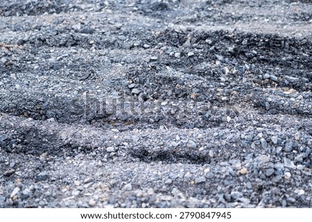 Explore intricacies of a construction site showcasing textured ground and development progress.