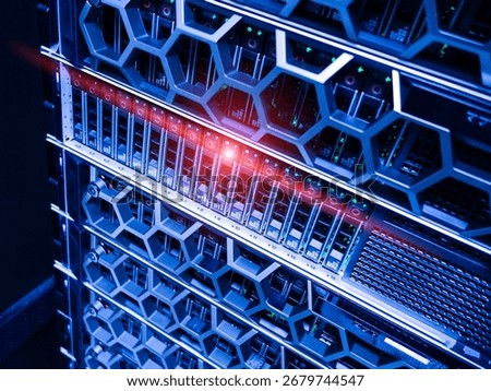Explore a modern data center rack featuring high-performance servers with LED indicators, showcasing advanced technology for efficient data processing and storage solutions.