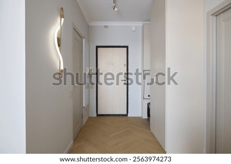 Explore the modern hallway design featuring elegant and stylish lighting options, enhancing decor