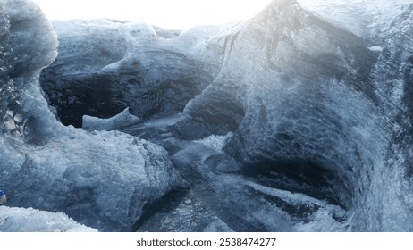 Explore the raw textures and surreal beauty within this Icelandic glacier cave. Perfect for projects capturing natural ice formations, atmospheric winter scenes, or abstract minimalism in nature. - Powered by Shutterstock