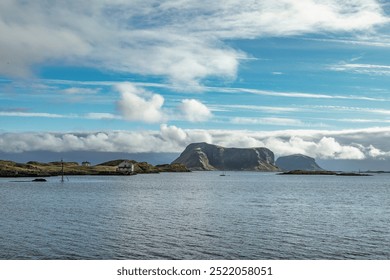 Explore the Serene Coastal Landscape of Lofoten Islands in Nordland County, Norway, Showcasing Calm Waters and Dramatic Hills - Powered by Shutterstock