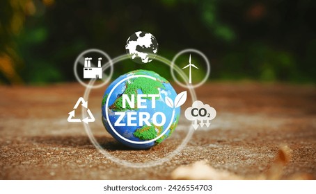 Explore a small world globe symbolizing CO2 reduction and net zero emissions by 2050. Embrace the icon of sustainability and join the journey towards a greener future.