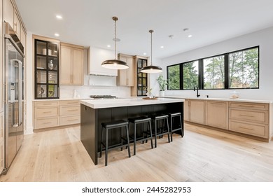 Explore stunning photos of a renovated luxury kitchen and dining room. Modern, trendy, exclusive, and amazing design await.  - Powered by Shutterstock