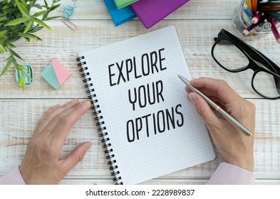 Explore Your Options write on sticky note isolated on Wooden Table. - Shutterstock ID 2228989837