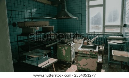 Exploring an abandoned kitchen in Pyramiden Svalbard revealing remnants of the past