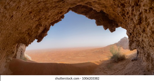 Exploring A Cave In Sharjah Desert