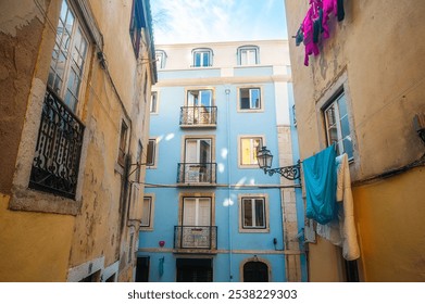 Exploring the charming streets of Lisbon, Portugal with historic architecture and vibrant street art on a sunny day - Powered by Shutterstock