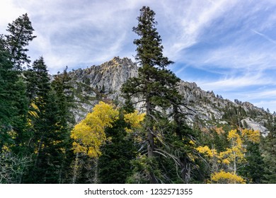 Exploring the mountains and cliffs during the fall in the Lake Tahoe area. Autumn leaves and granite landscapes.