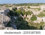 Exploring a sink hole on the island of Malta with caves near Misrah Ghar il-Kbir (Clapham Junction)