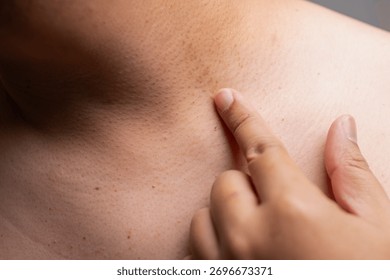 Exploring skin sensitivity through close-up examination in a home setting.