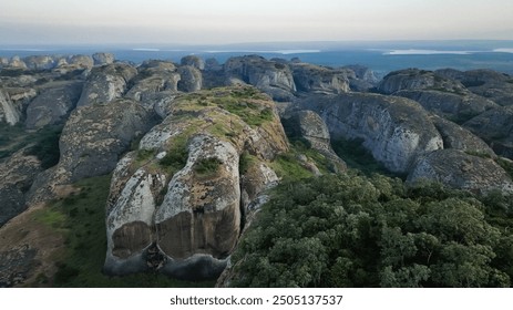 Exploring the unique rock formations of the Pedras Negras Mountains in Angola at sunrise