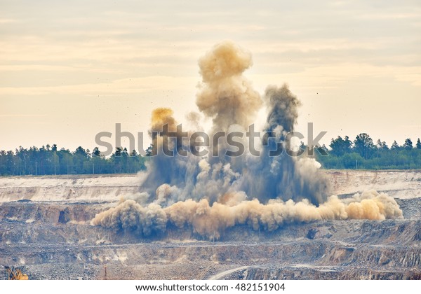Explosion blast in\
open cast mining quarry\
mine