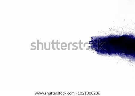 Explosion of blue dust on white background.
