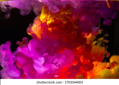 The Explosion of color. Bright colors spilled under the water and mixed