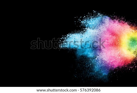 Explosion of colored powder, isolated on black background