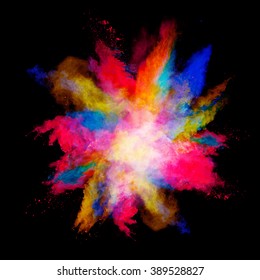 Explosion of colored powder on black background - Shutterstock ID 389528827