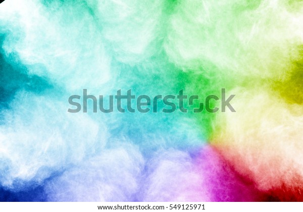 Explosion of colored powder on white background\
,Freeze motion of color powder exploding/throwing color powder,\
multicolored glitter\
texture.