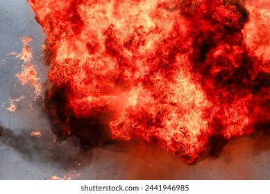 Explosion of explosives, large fire.