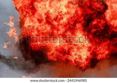 Explosion of explosives, large fire.
