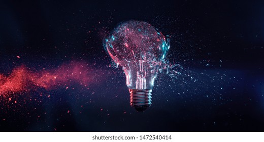 Explosion Of A Filament Electric Bulb At The Moment Of Impact. High Speed Photography.