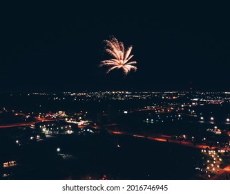 An explosion of fireworks from above. The photo was taken on the engine.