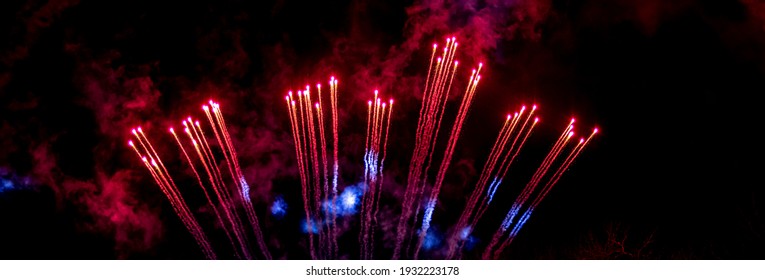 Explosion of fireworks rockets. The fiery tails of comets. Details and elements of outer space. Smoke and gas of stars. - Shutterstock ID 1932223178