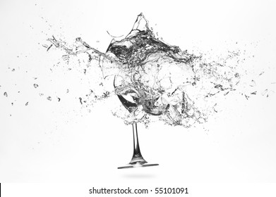 Explosion Of A Glass With Water On A White Background