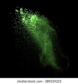 Explosion Of Green Powder On Black Background