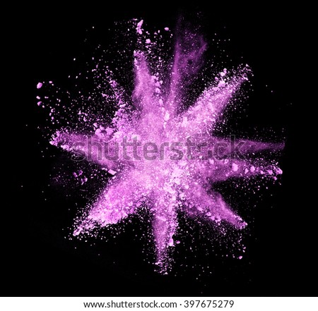 Explosion of purple powder on black background