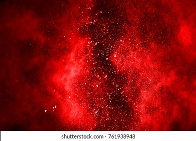 Explosion Of Red Powder On Black Background