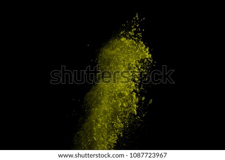 The explosion and splash of color powder. Abstract color powder explosion on black background. Abstract Freeze motion of color powder splash.