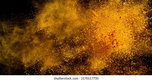 Explosion, Splashes of turmeric on a black background. India Seasoning. The orange powder of the turmeric root. Explosion of powder - Shutterstock ID 2170117735