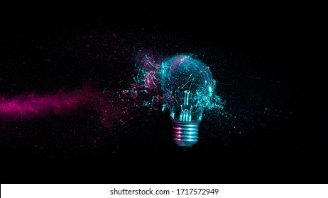 explosion of a traditional electric bulb. shot taken in high speed, at the exact moment of impact. concept of creativity and fragility.