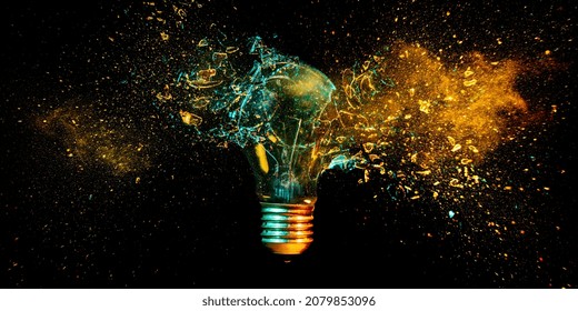 explosion of a tungsten light bulb on black.
