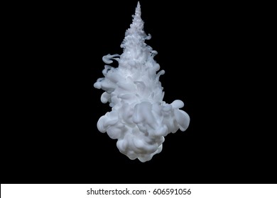 Explosion Of White Acrylic Paint In Water On Black Background.