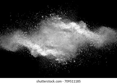 Explosion Of White Dust On Black Background.