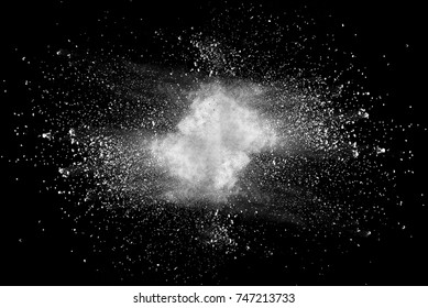 Explosion Of White Dust On Black Background.