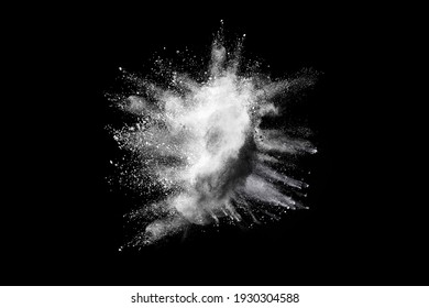 Explosion of white powder isolated on black background. Abstract colored background. holi festival. - Shutterstock ID 1930304588