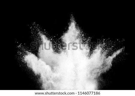 Explosion of white powder on black background ,Freeze motion of color powder exploding/throwing color powder, multicolored glitter texture.