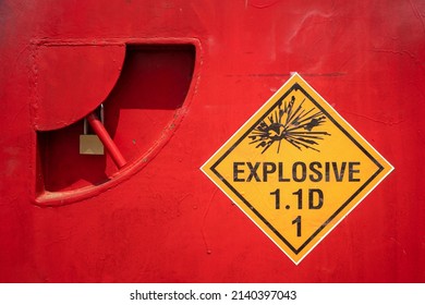 An Explosive Material Placard Symbol On The Metal Container Box With Locking Key For Security.  