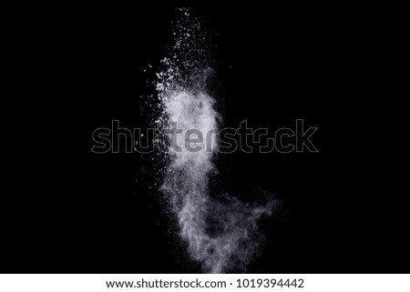 Explosive powder white on black background.